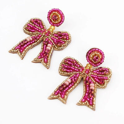 Pink Bow Drop Earrings My Doris 
Beaded on fabric bow shaped earrings in pink 